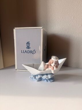 Lladro White Porcelain Paper Boat with Pink/Brown Puppy on Blue Waves